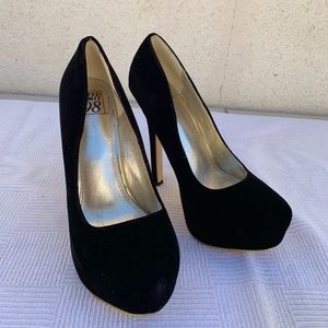 Black suede pumps by Speed Limit 98